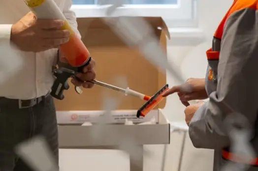 Adhesive spreader
